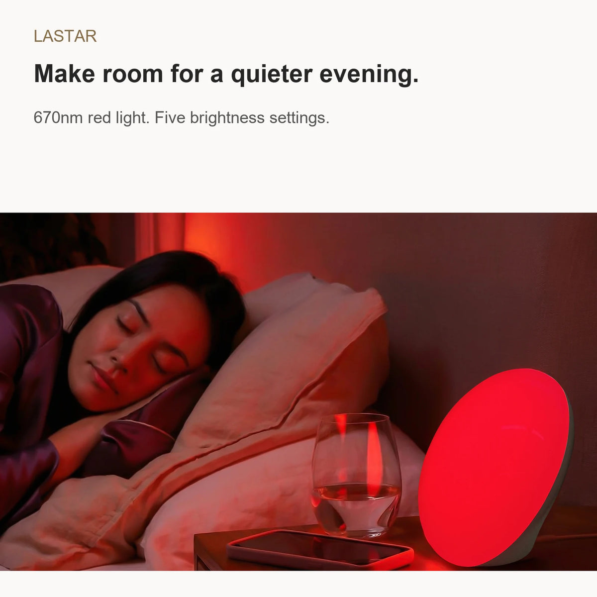 LASTAR 670nm red light lamp on a bedside table