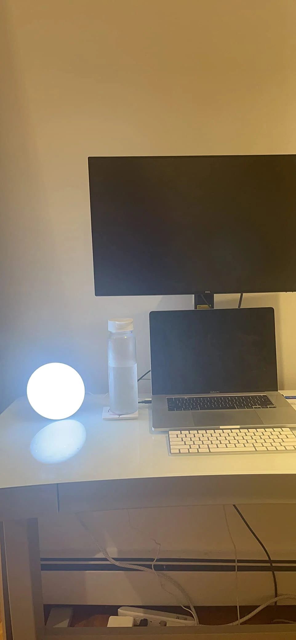 A round-lamp desk setup